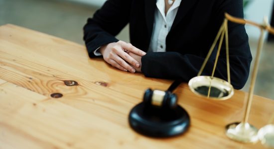 Portrait of a lawyer studying a lawsuit for a client before going to court Portrait of a lawyer studying a lawsuit for a client before going to court.